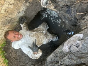 A bluefrog Plumbing and Drain team member working in West University