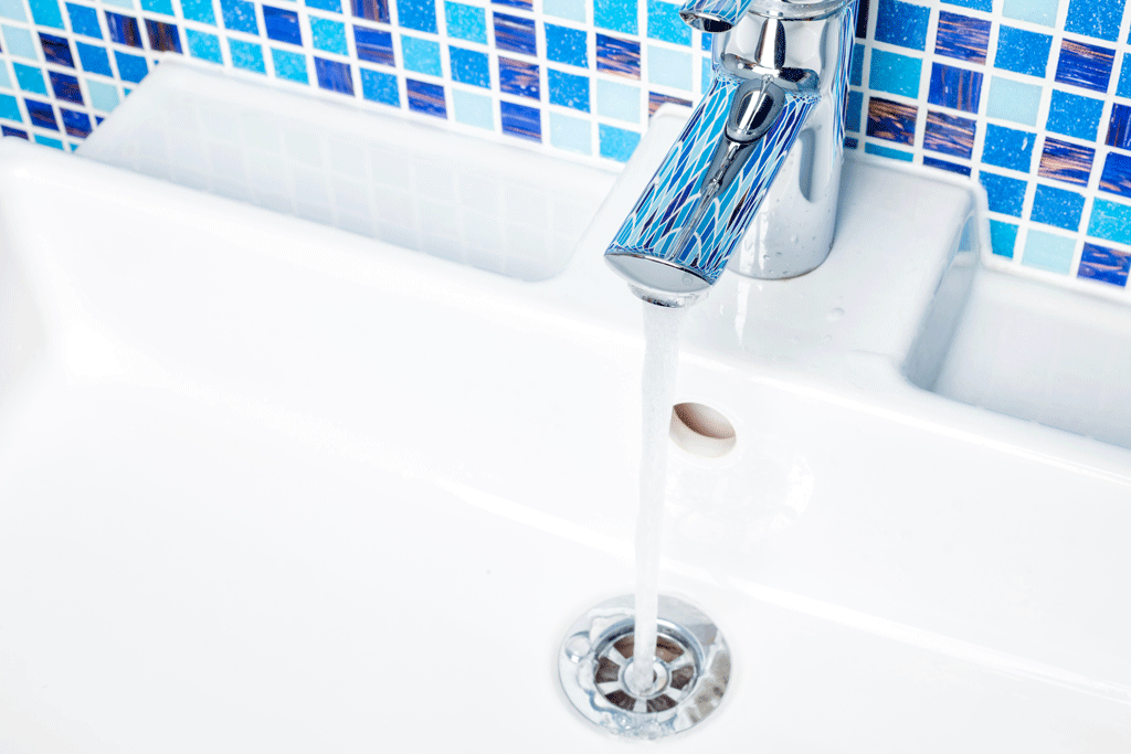 bathroom sink leaking with blue tile plumbing repair katy tx sugarland tx 