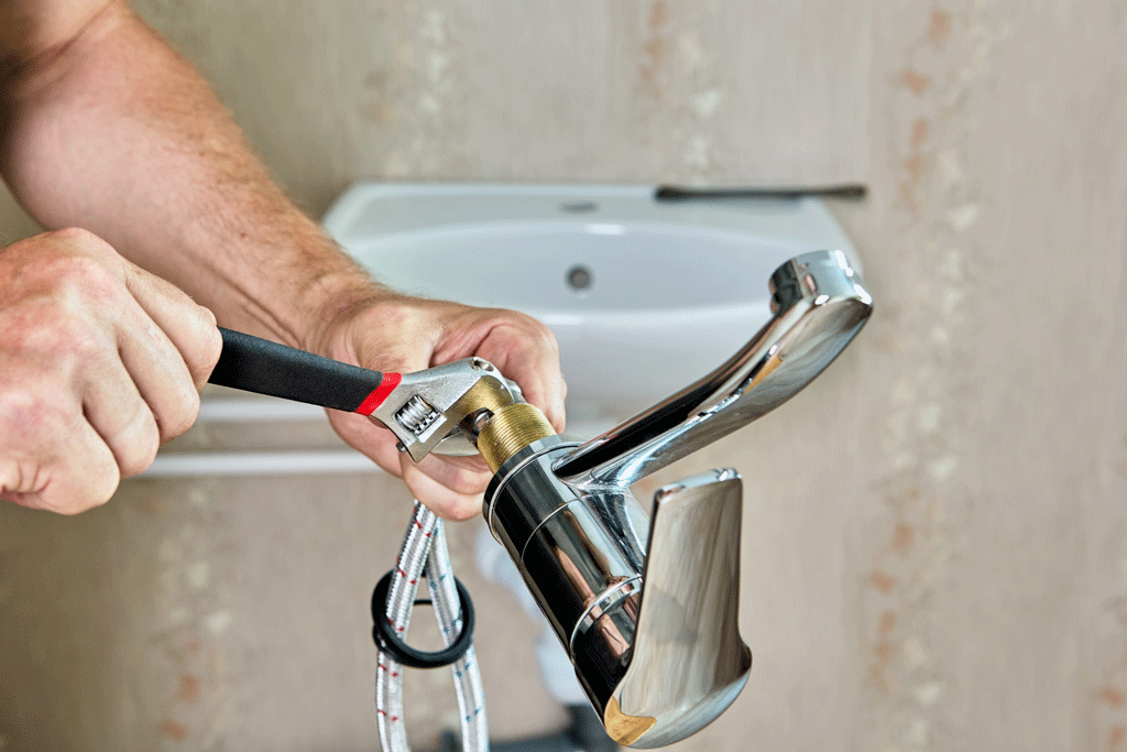 plumber fixing sink faucet emergency plumbing katy tx sugarland tx 